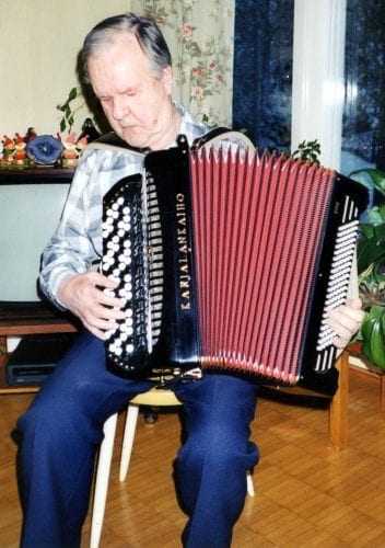 Tauno Pesu plays the accordian he have made.